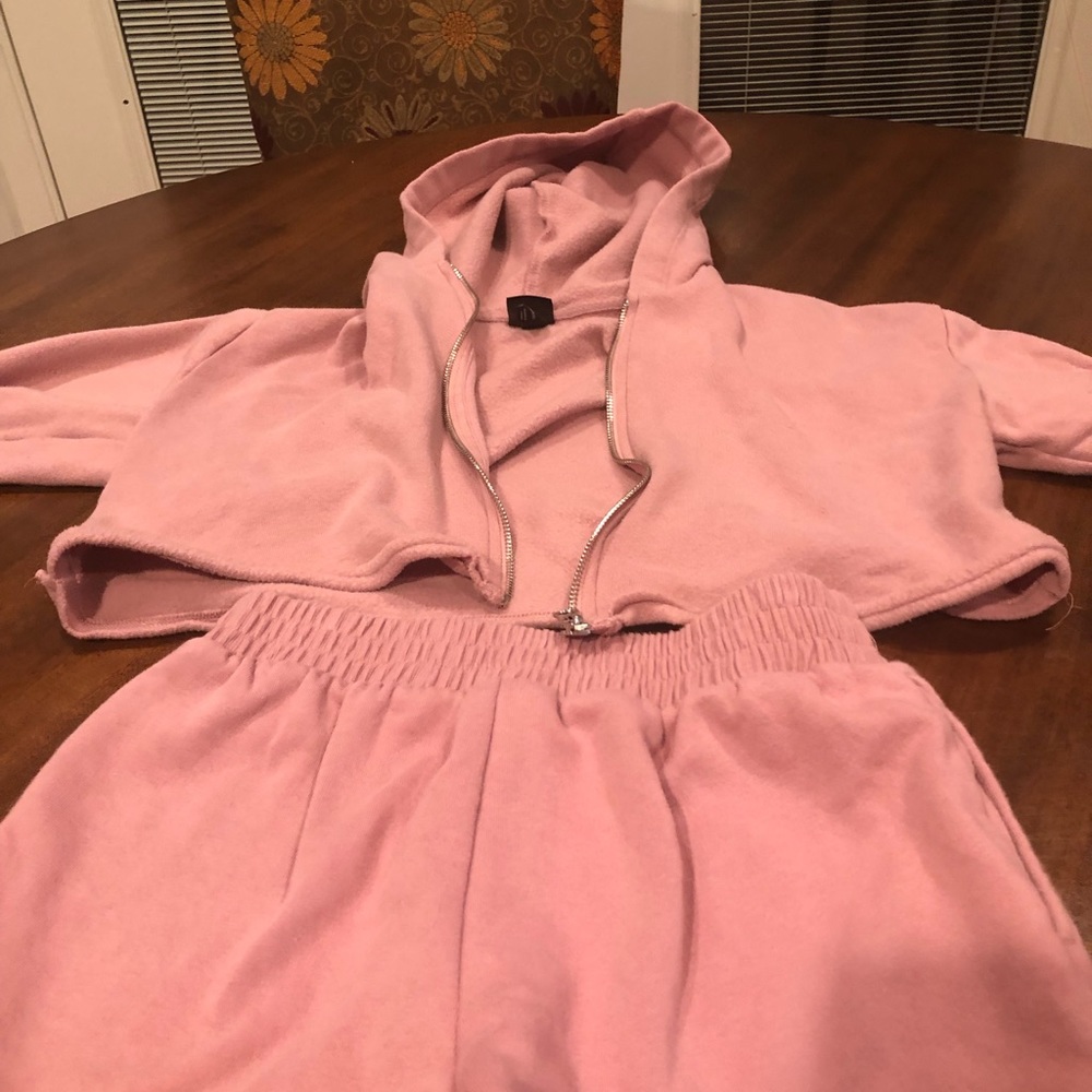 Pink cropped zip up hoddie and matching shorts